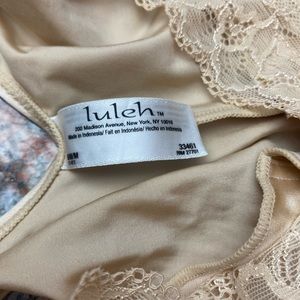 Luleh body shaper new with tags. Gives you thst smooth sexy fit under clothing.